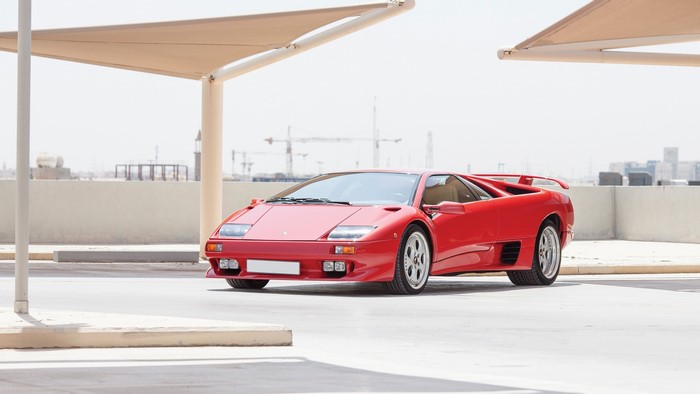 Red Lamborghini Diablo parked outdoors
