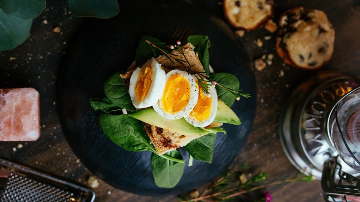 Open-faced egg and avocado sandwich on toast