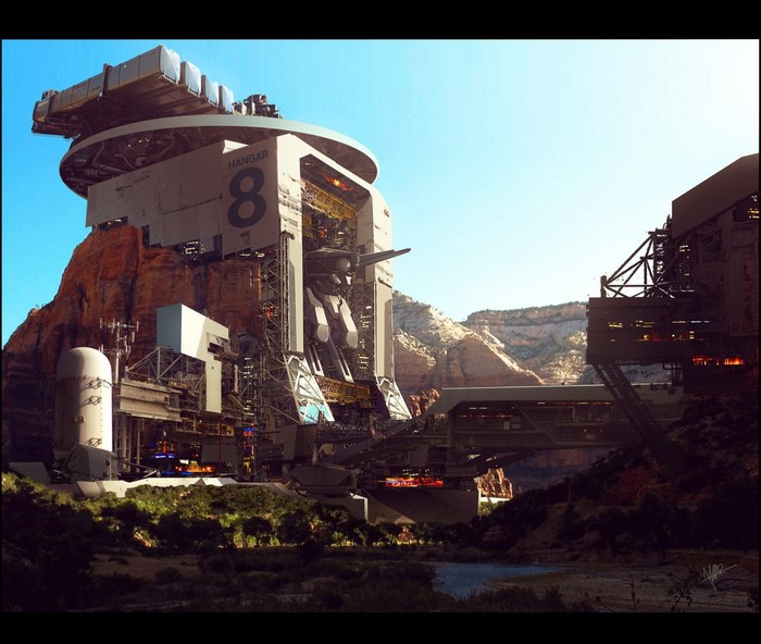 Futuristic hangar built into a canyon wall