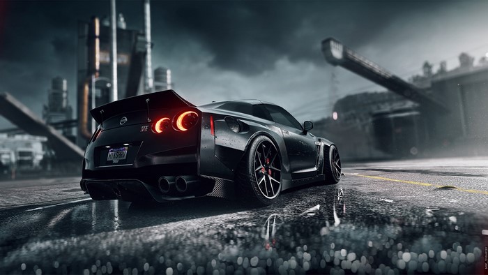 Black Nissan GT-R R35 on wet road