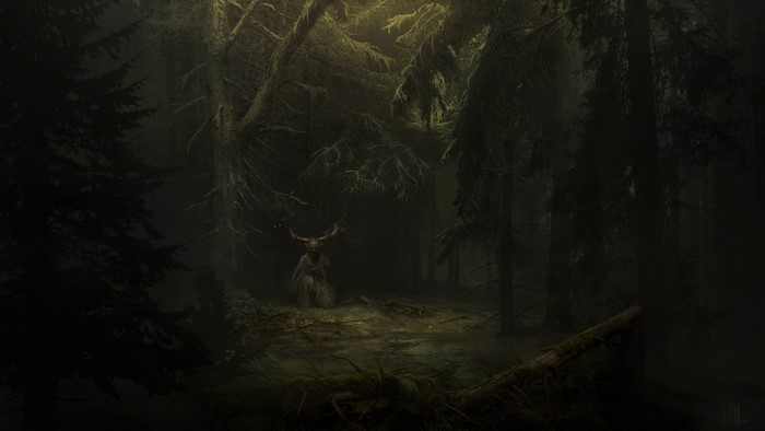 Creature with antlers in a dark, misty forest