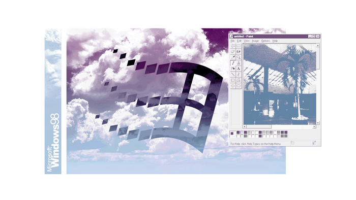 Microsoft Windows 98 Paint application with cloud background