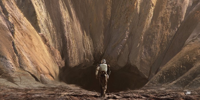 The Mandalorian in a rocky canyon
