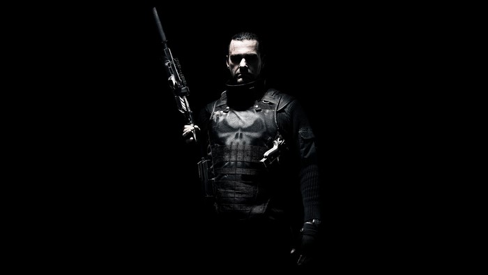 The Punisher holding a rifle