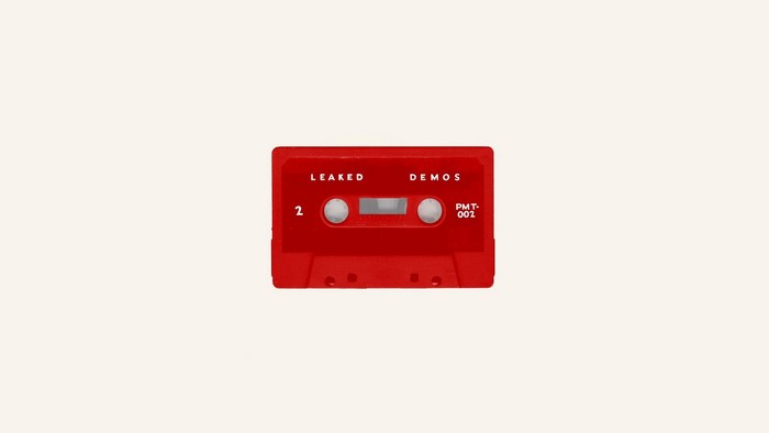 Red cassette tape labeled "LEAKED DEMOS"