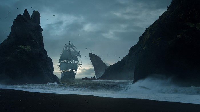Sailing ship navigating between rocky cliffs with birds overhead