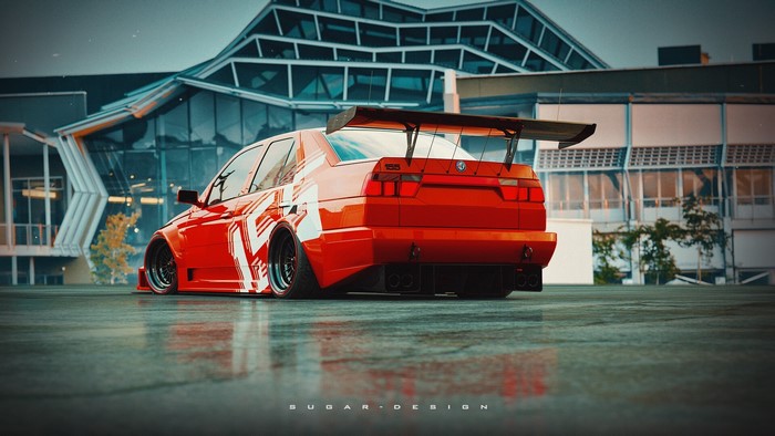 Red Alfa Romeo 155 with a large rear spoiler