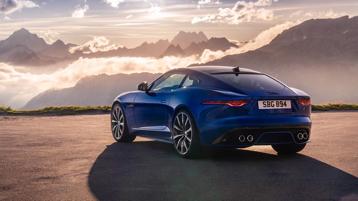 Blue Jaguar F-Type Coupe in Mountains