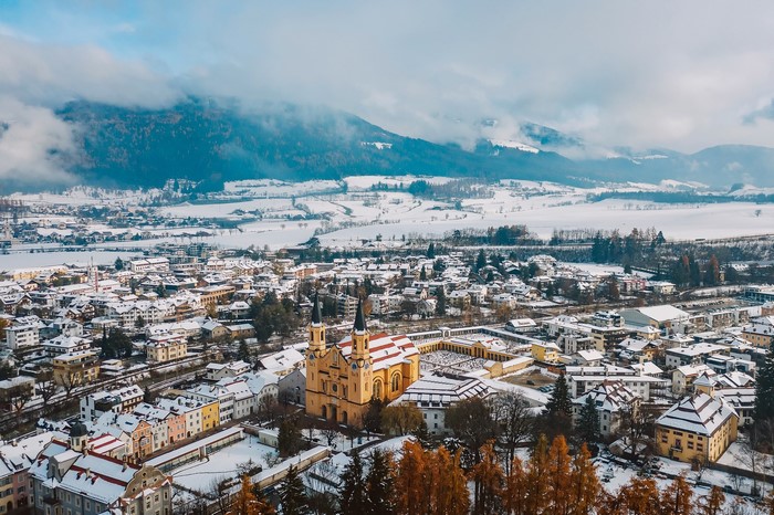 Winter town with church in South Tyrol, Italy