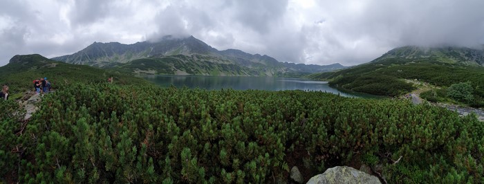 Panoramic view of Tatra Mountains lake and mountains