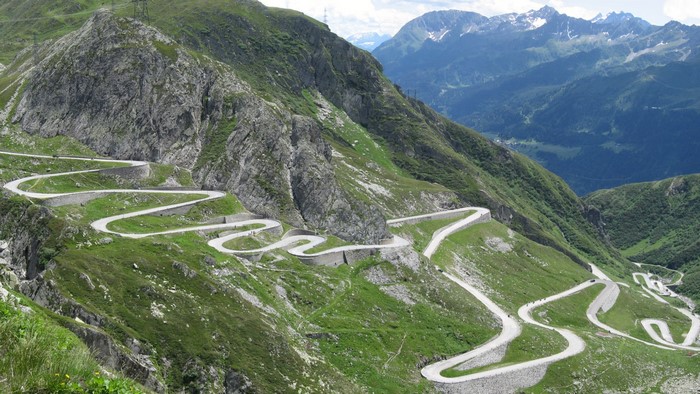 Winding mountain road through a scenic pass