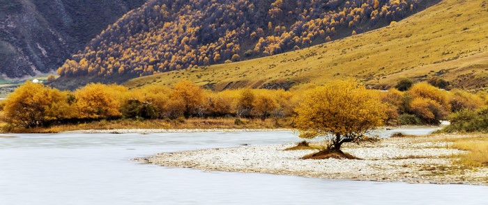 Autumn landscape with mountains and river