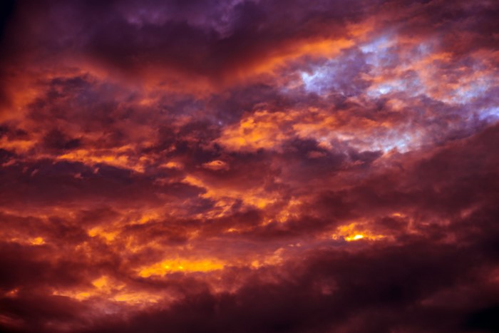 Dramatic sunset clouds with orange and purple hues