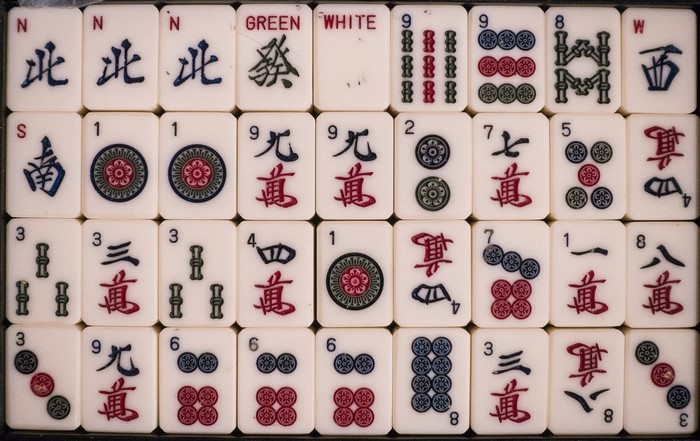 Mahjong tiles with Chinese characters and numbers