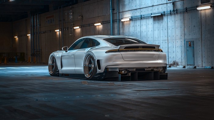 White Porsche Taycan modified in a parking garage