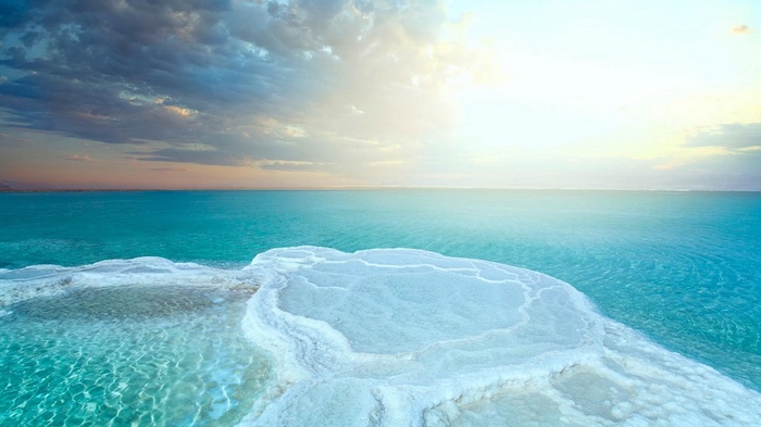 The Dead Sea with salt formations at sunrise