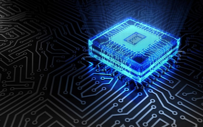 Blue glowing CPU on a circuit board
