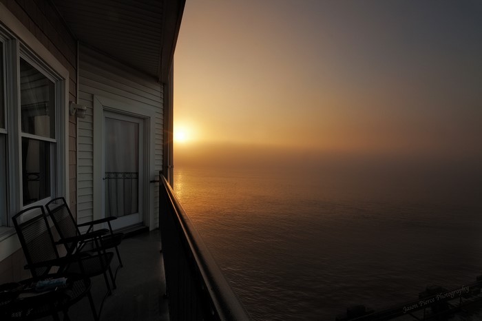 Sunrise over the Hudson River from a balcony