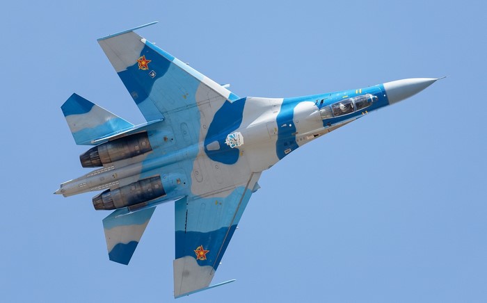 Sukhoi Su-27 jet fighter in blue camouflage