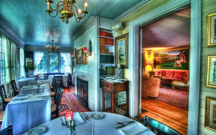 Restaurant interior with tables and artwork
