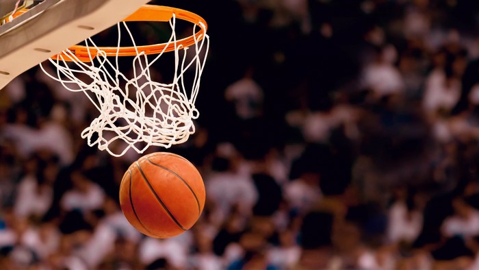 Basketball going through hoop