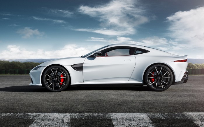 White Aston Martin Vantage on a race track