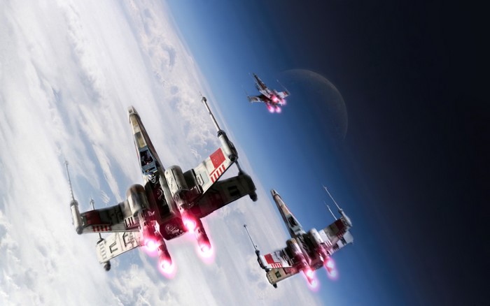 Star Wars X-wings flying over a planet