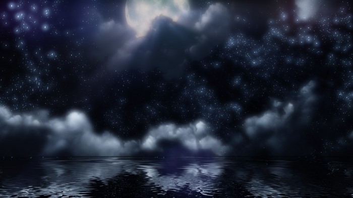 Night sky with moon, stars, and clouds reflected in water