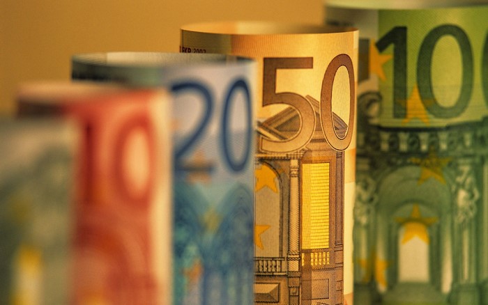 Rolled Euro banknotes: 10, 20, 50, and 100