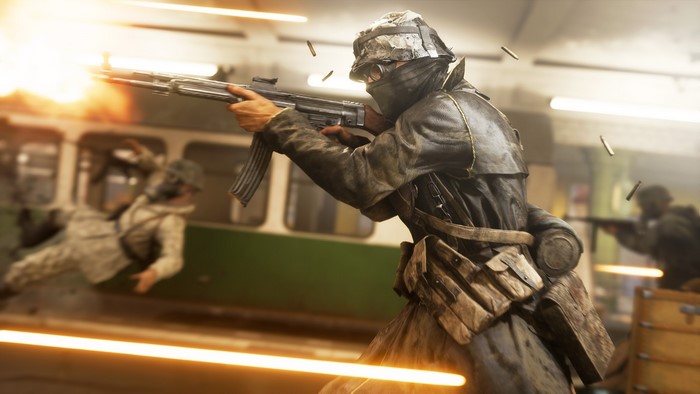 Soldiers in combat with guns firing in Battlefield V