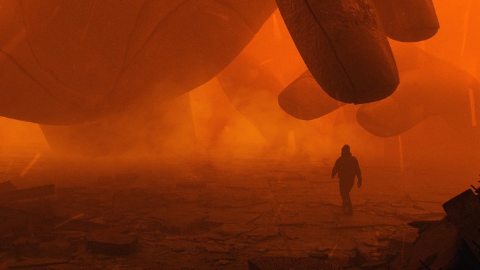 Man walking in a desolate, orange, futuristic landscape