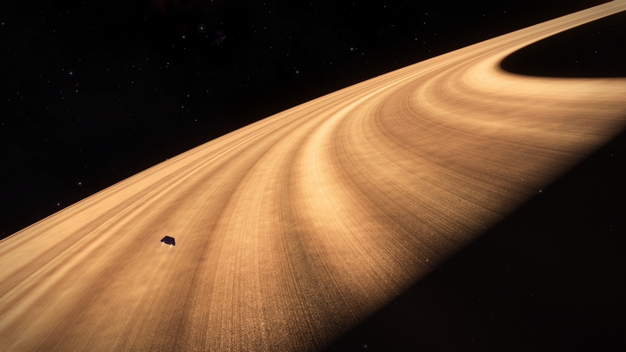 Spaceship near planet rings in Elite: Dangerous