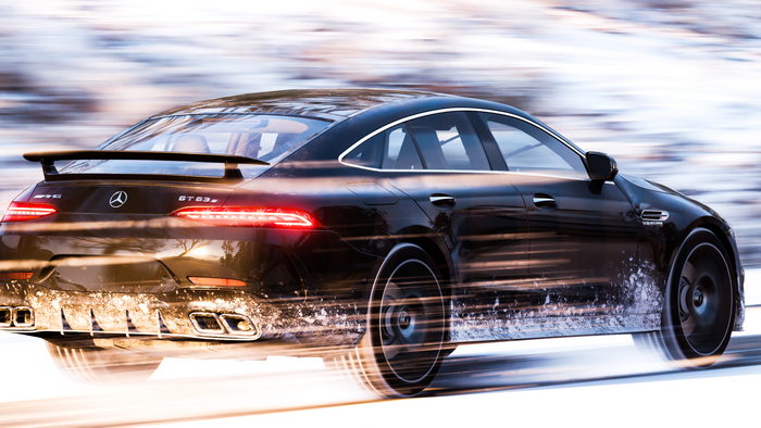 Mercedes-Benz GT 63 S driving in snow with motion blur