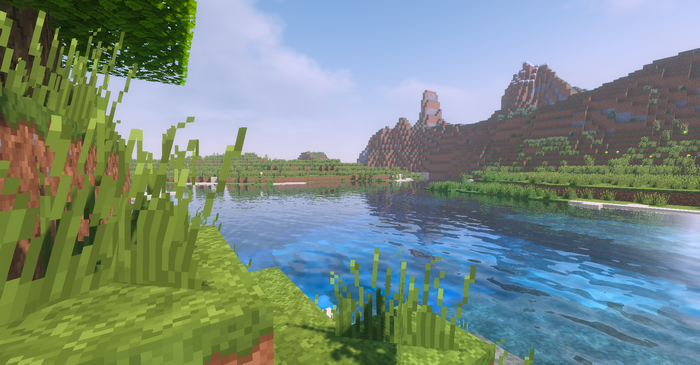Minecraft landscape with lake and mountains