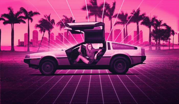 Amber Heard in a DeLorean car with open doors