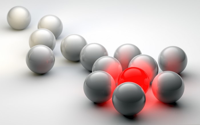 Group of gray and red glowing balls