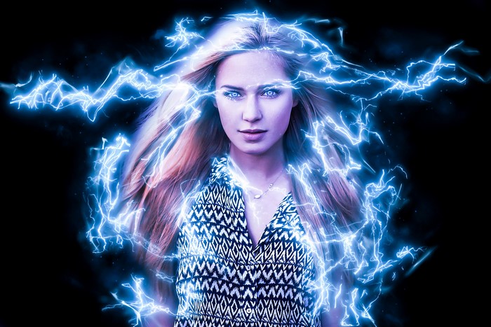 Woman surrounded by blue lightning