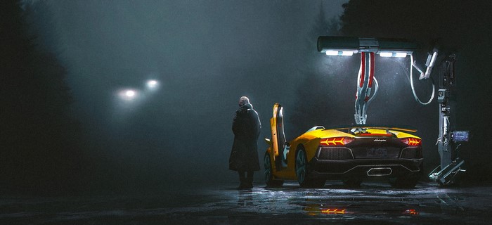 Man and Lamborghini Aventador at futuristic car wash