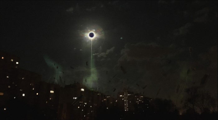 Digital art of a black hole over a city at night