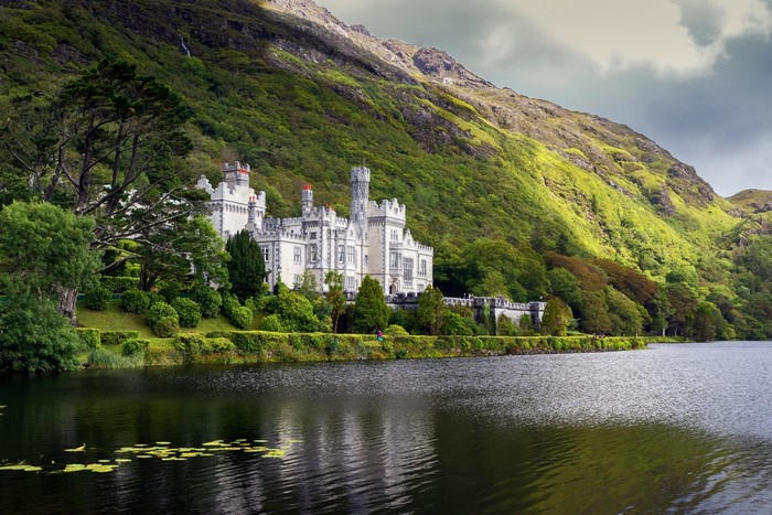 Kylemore Abbey on a lake in Ireland
