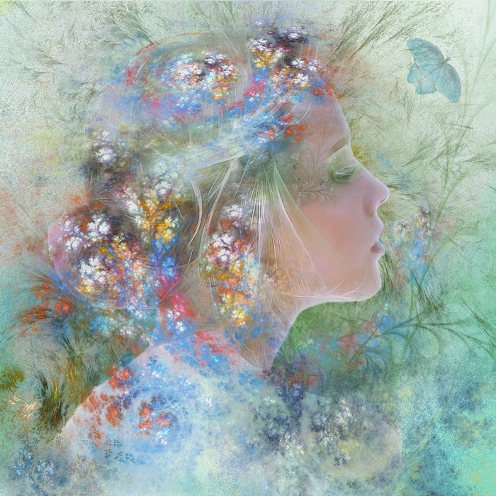 Artwork of a woman's profile with floral elements