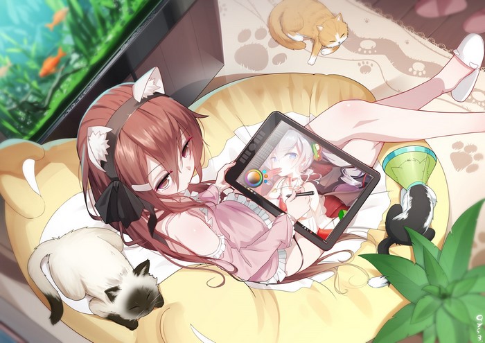 Anime girl with cat ears drawing on tablet