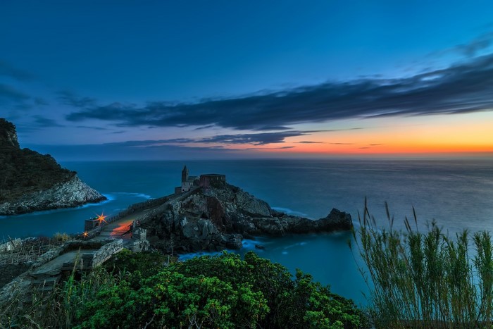 Church on the coast of Liguria, Italy at sunset