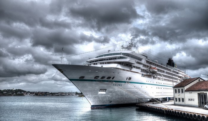 Amadea cruise ship docked under cloudy sky
