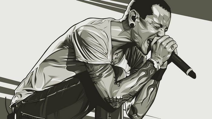 Chester Bennington from Linkin Park singing into a microphone