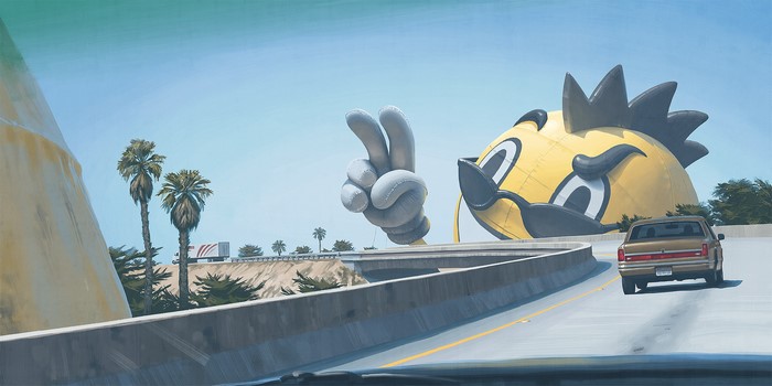 Giant inflatable character on a highway overpass