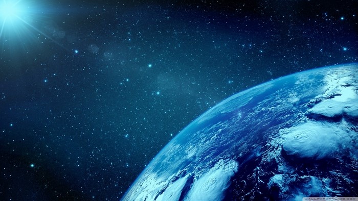 Earth from space with stars and sun