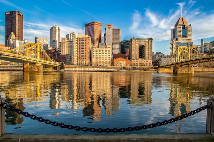 Pittsburgh cityscape with bridges and river reflections