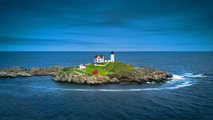 Nubble Lighthouse on a rocky island in Maine, USA