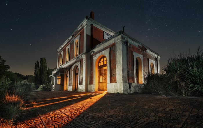 Old building at night with stars